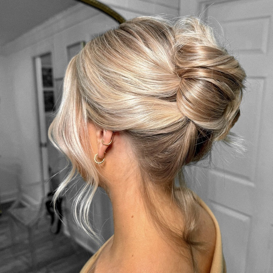 16. Polished Blonde French Twist with Soft Layers - Wedding Hairstyles