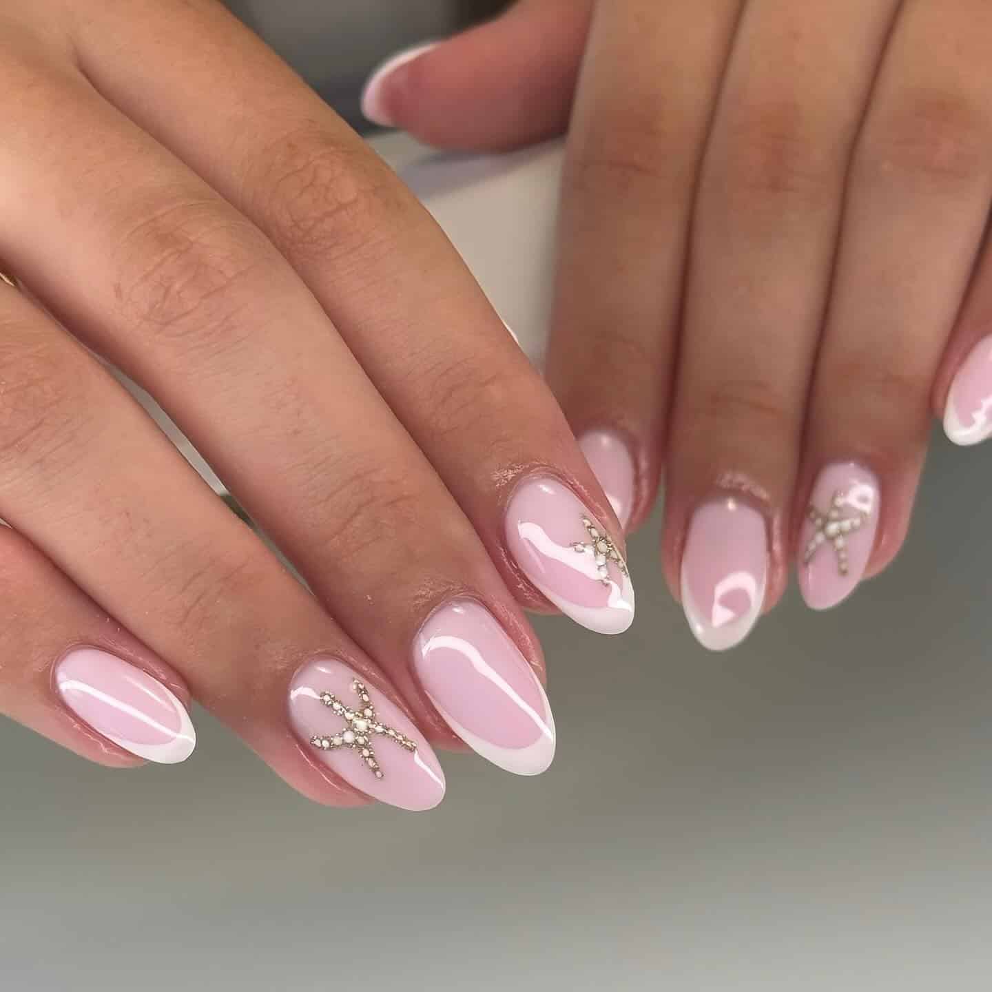 2. Blush Almond French with Crystal Cross Accents - pink almond nail ideas