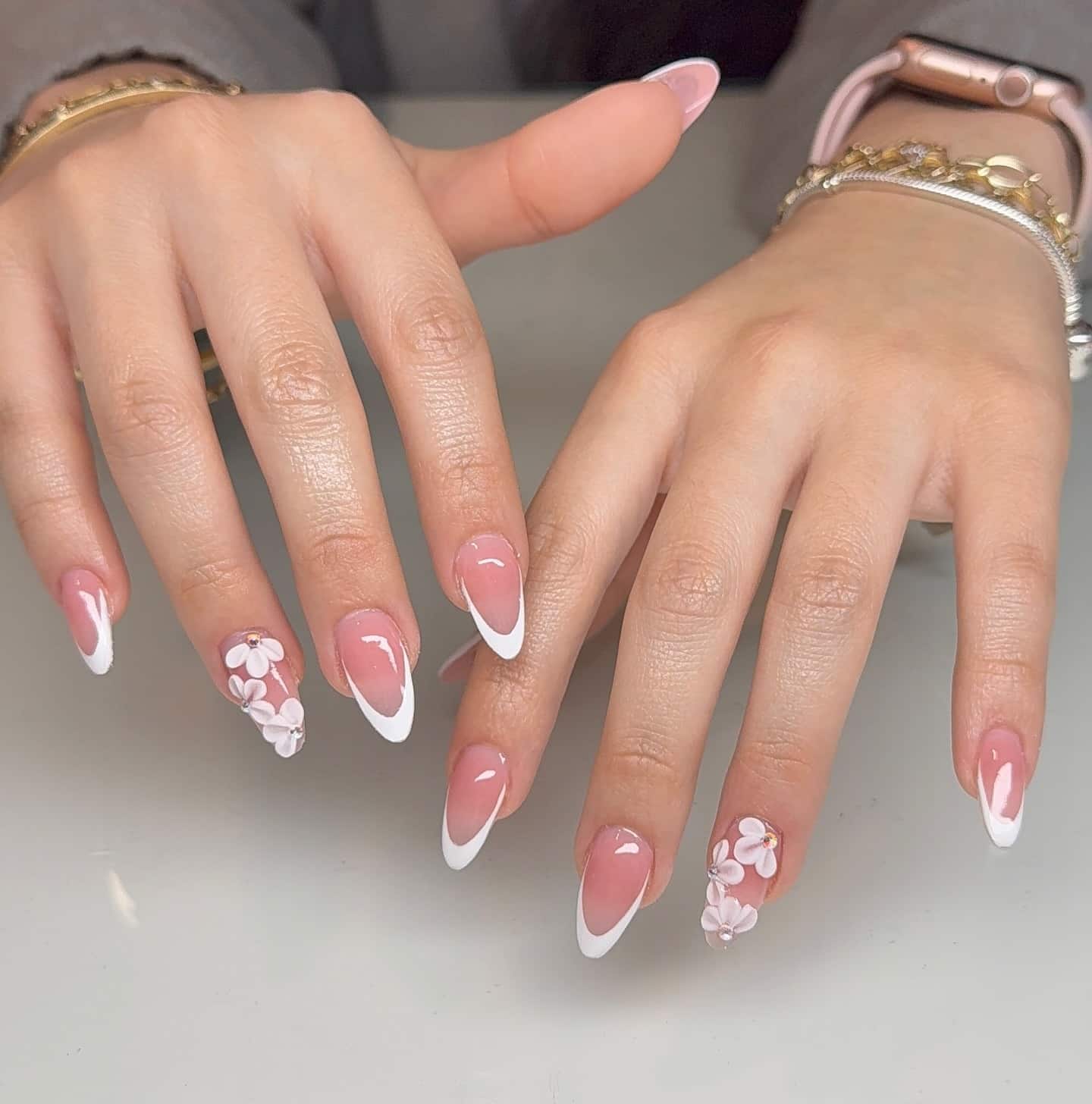3. Classic Pink Almond French with Floral Touch - pink almond nail ideas