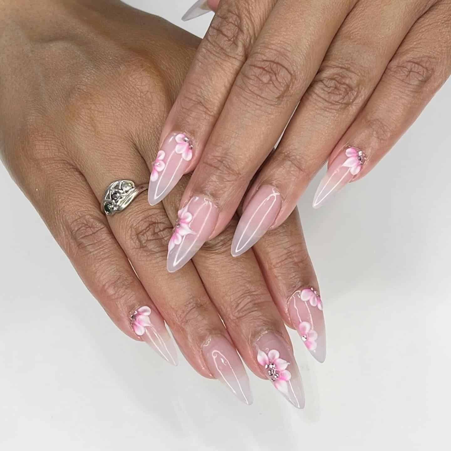 9. Sheer Pink Almond Nails with 3D Blossoms - pink almond nail ideas