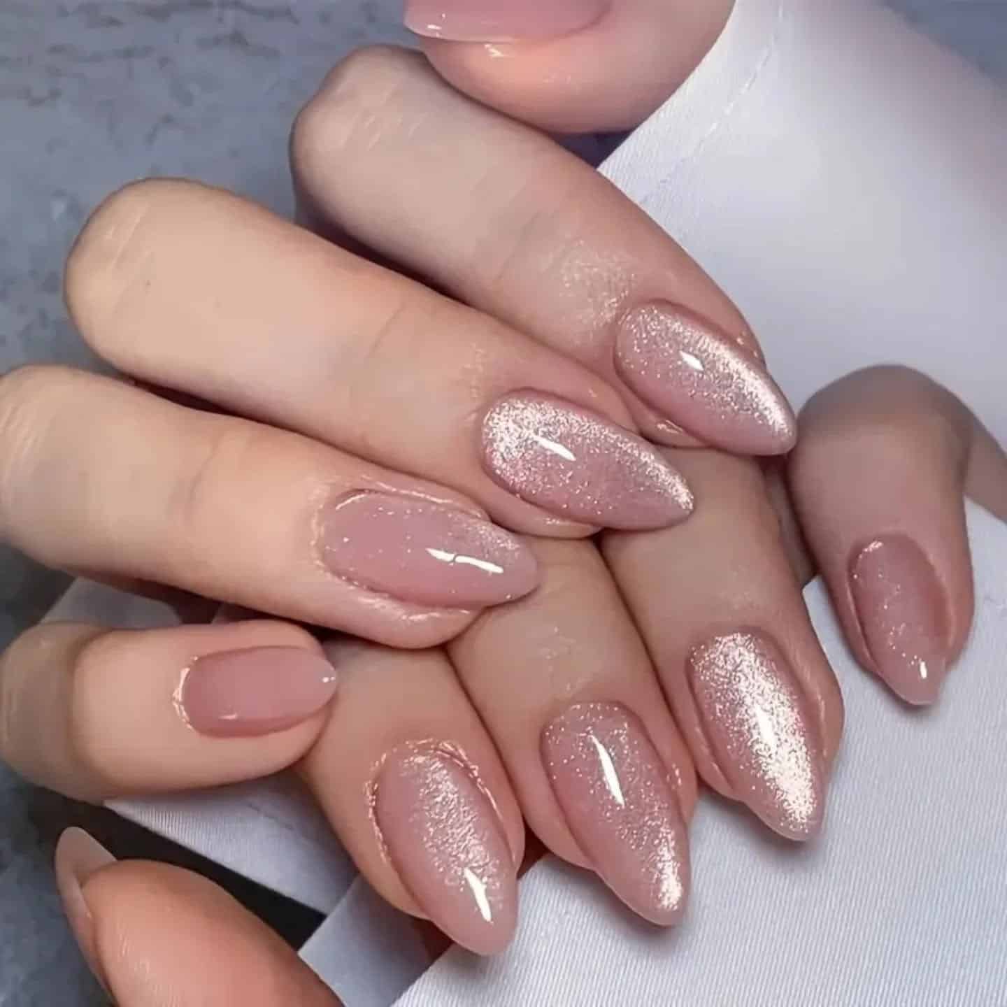 18. Rose Gold Shimmer Almond Nails - pink almond nail ideas