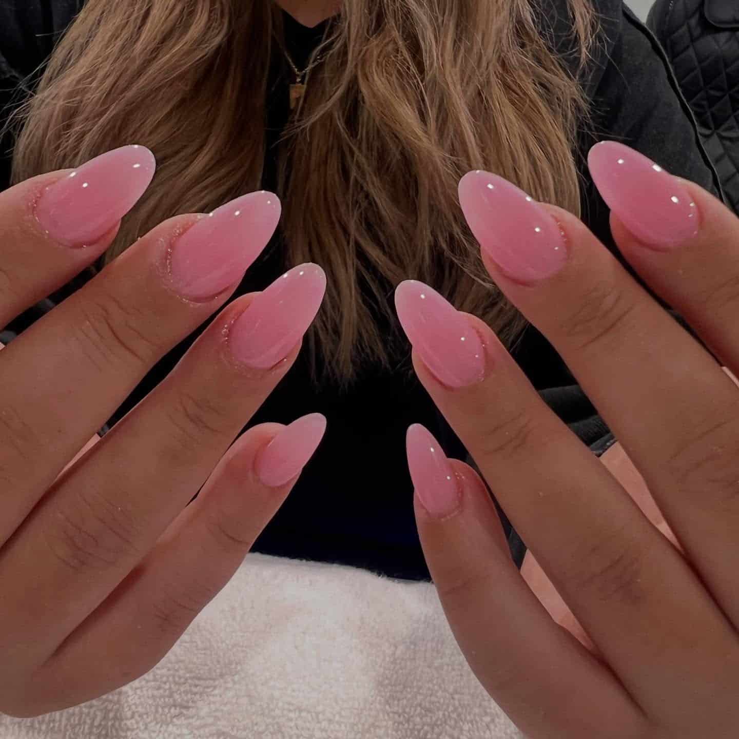 19. Glossy Candy Pink Almond Nails - pink almond nail ideas