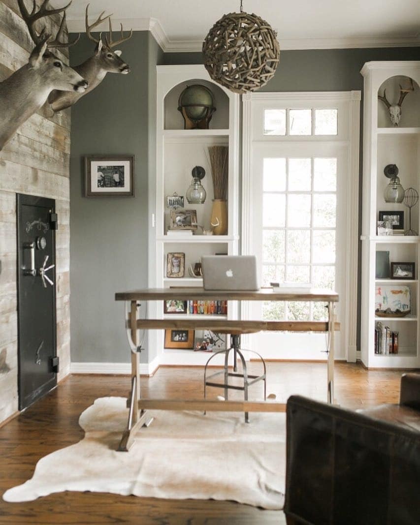 12. Classic Rustic Office with Antlers and Natural Tones - rustic home office ideas
