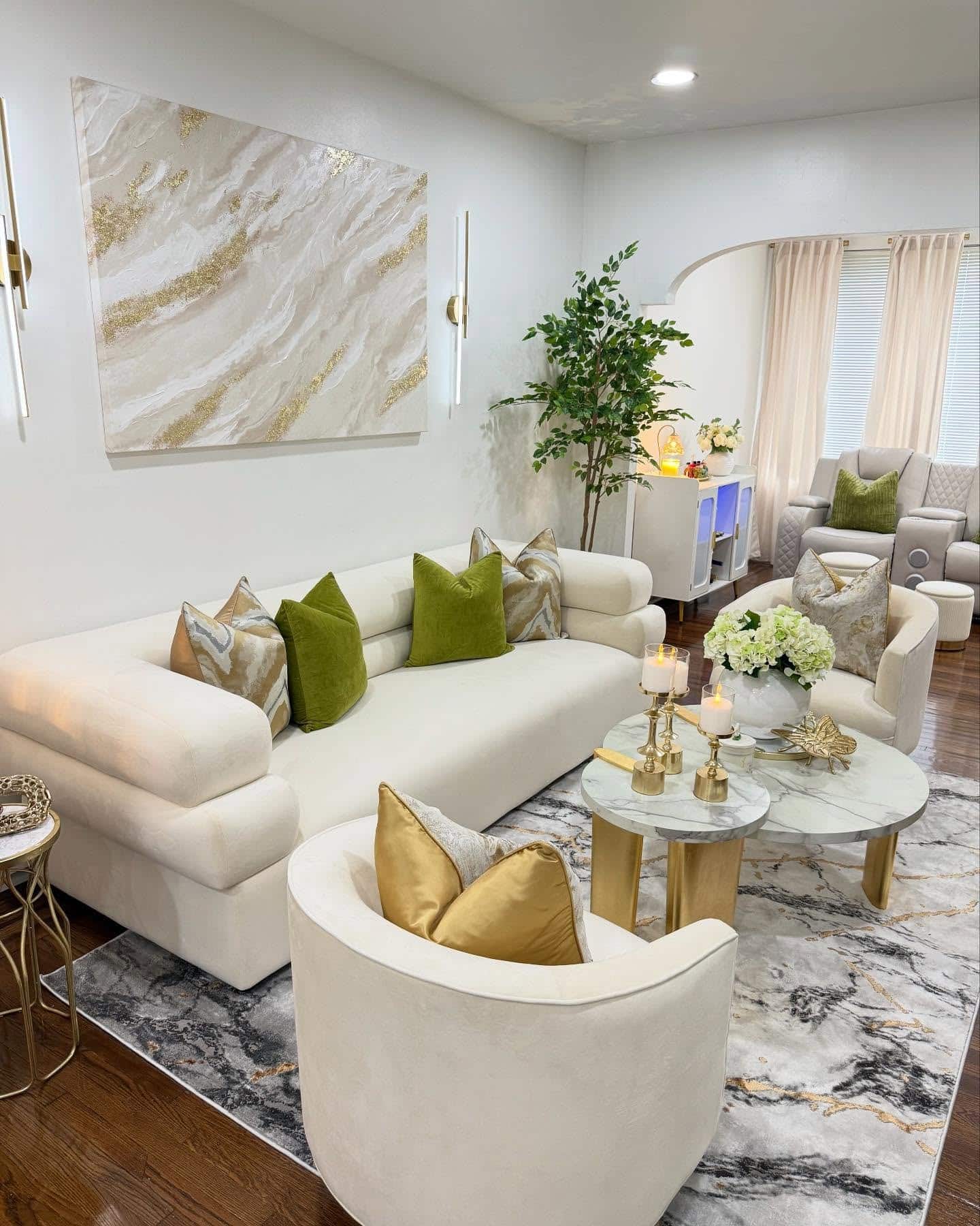 2. Elegant Neutrals with Gold and Green Accents - living room decor ideas