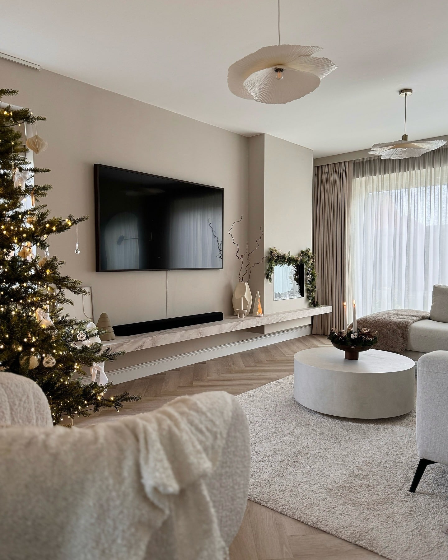 19. Subtle Holiday Warmth with Soft Neutrals - living room decor ideas