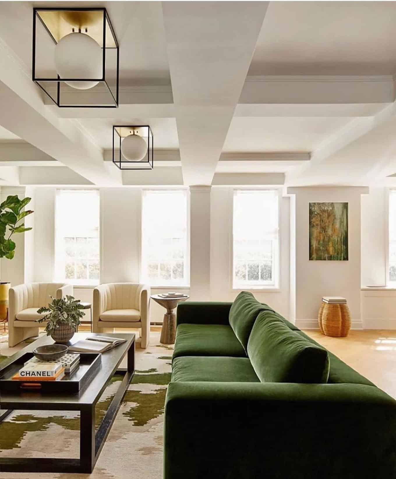 20. Modern Glam with Emerald Green Sofa - living room decor ideas