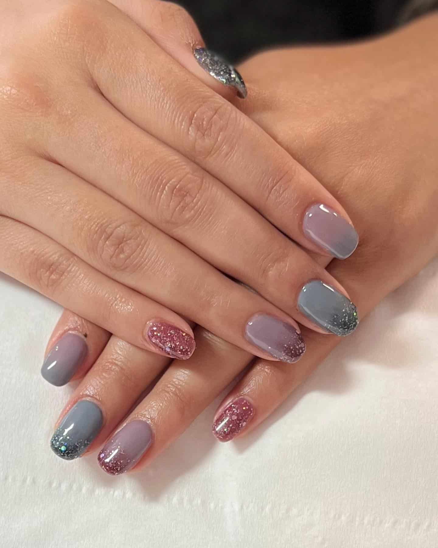 4. Glitter-Tipped Pink and Grey Harmony - pink and grey nail ideas