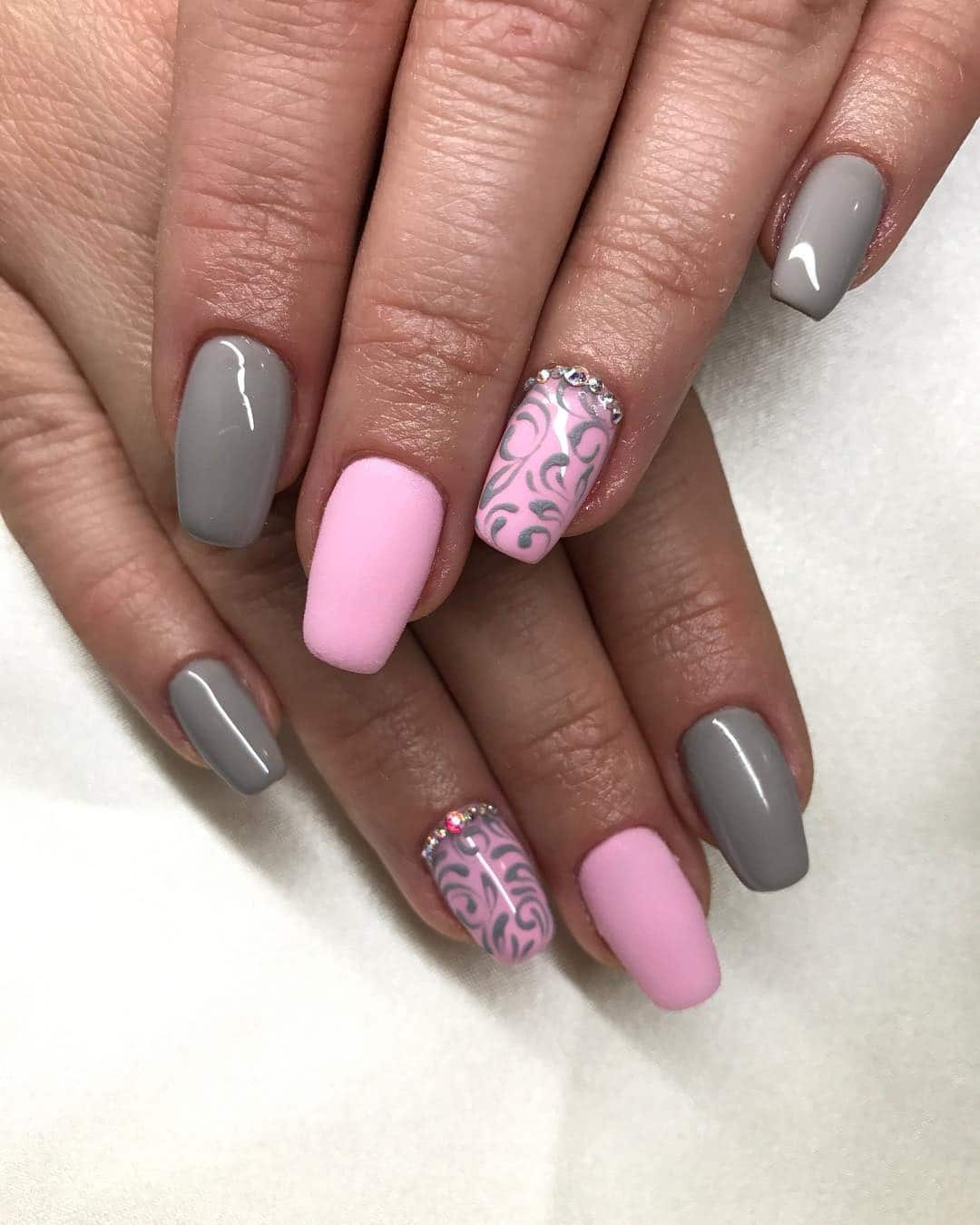 13. Matte Pink and Grey with Scrollwork - pink and grey nail ideas