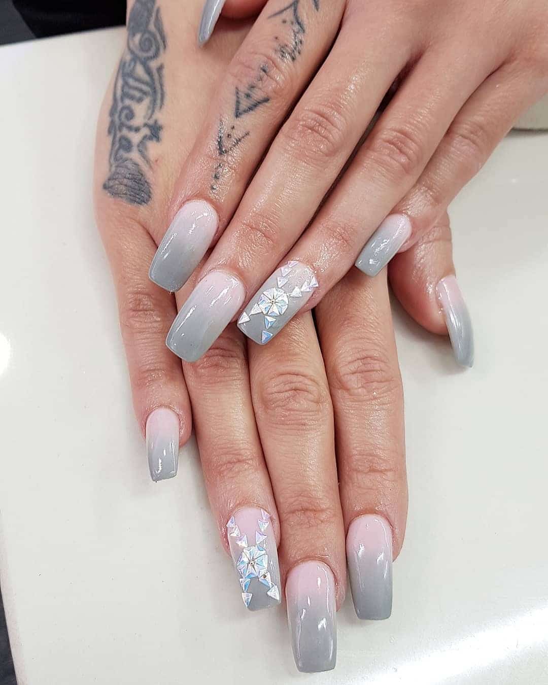 20. Ombre Grey and Pink with Crystal Embellishments - pink and grey nail ideas