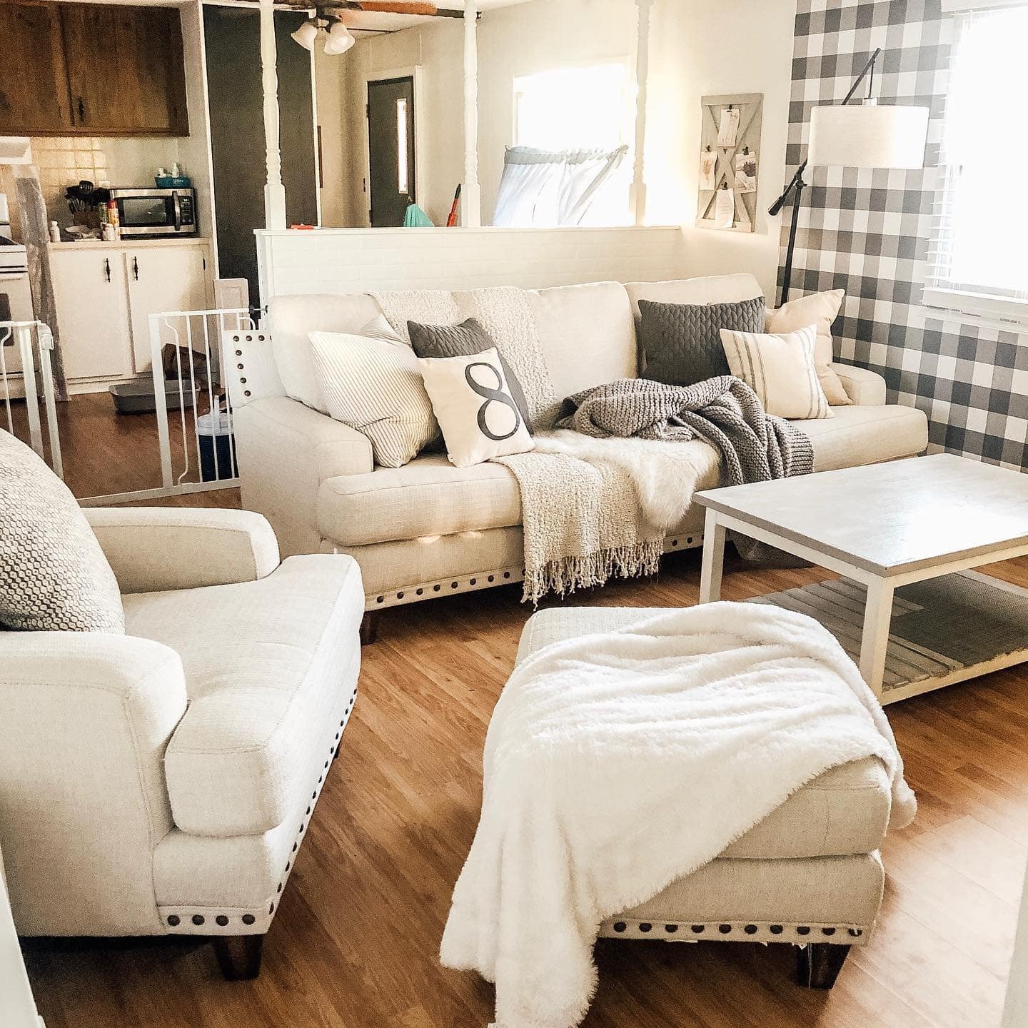 2. Cozy Farmhouse Comfort - mobile home living room ideas