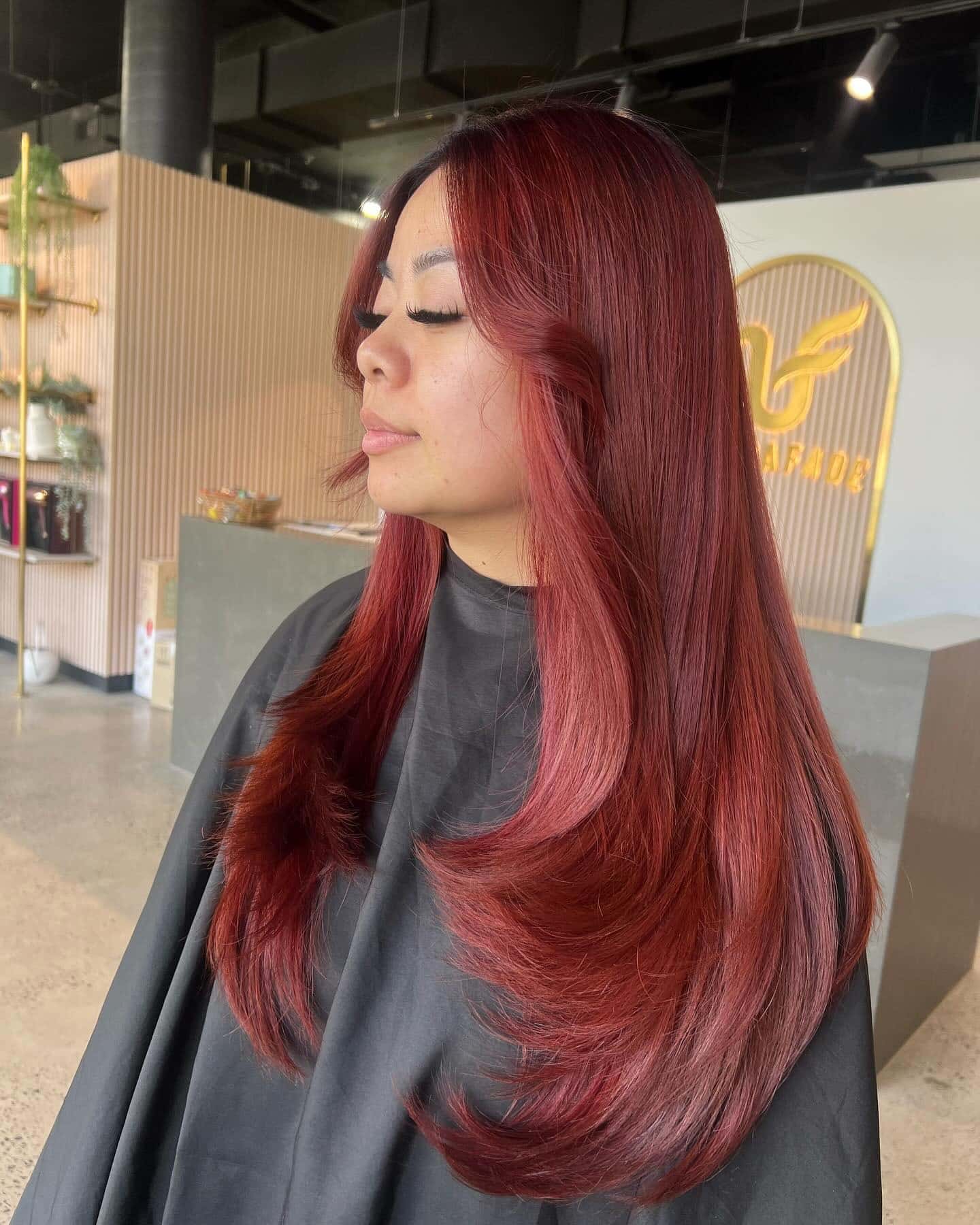 2. Sleek Cherry Red with Face-Framing Contour - Cherry Red Hair Color