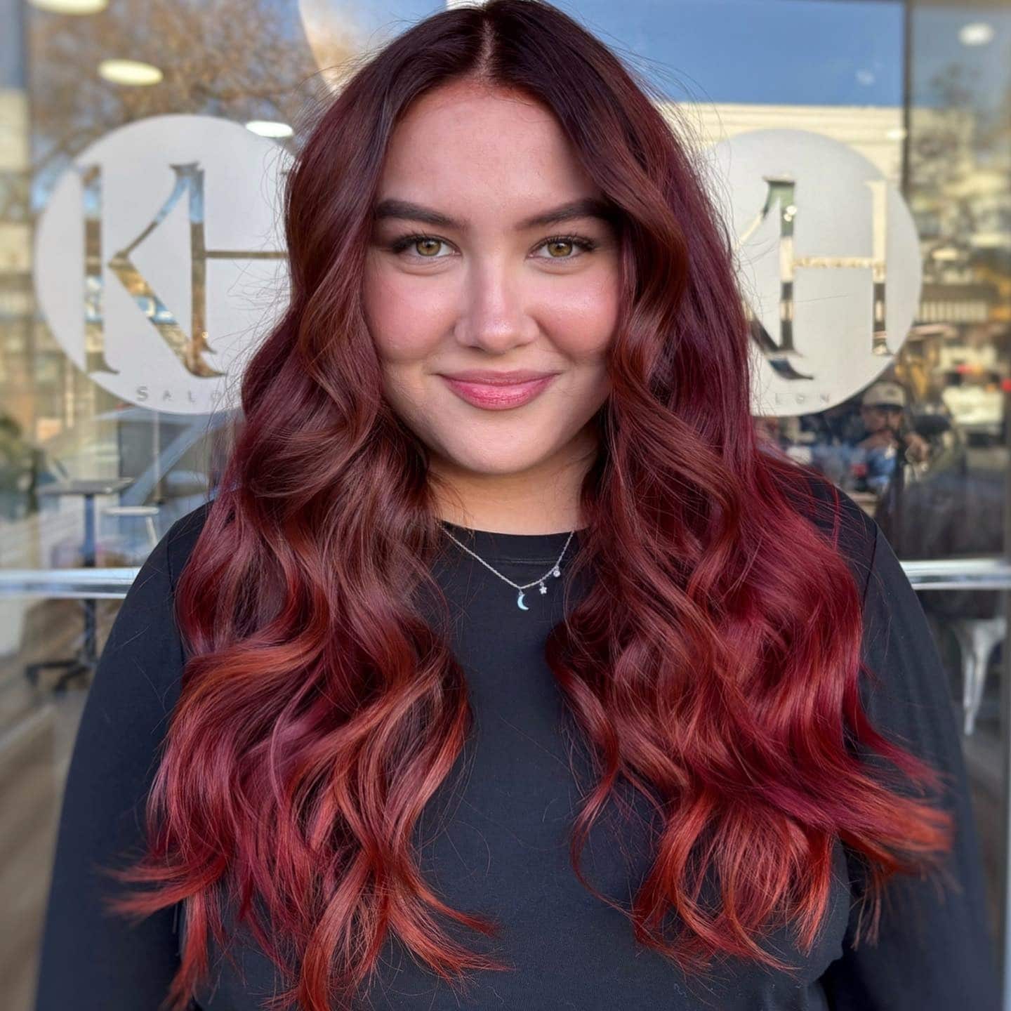 5. Wavy Cherry Red Balayage - Cherry Red Hair Color