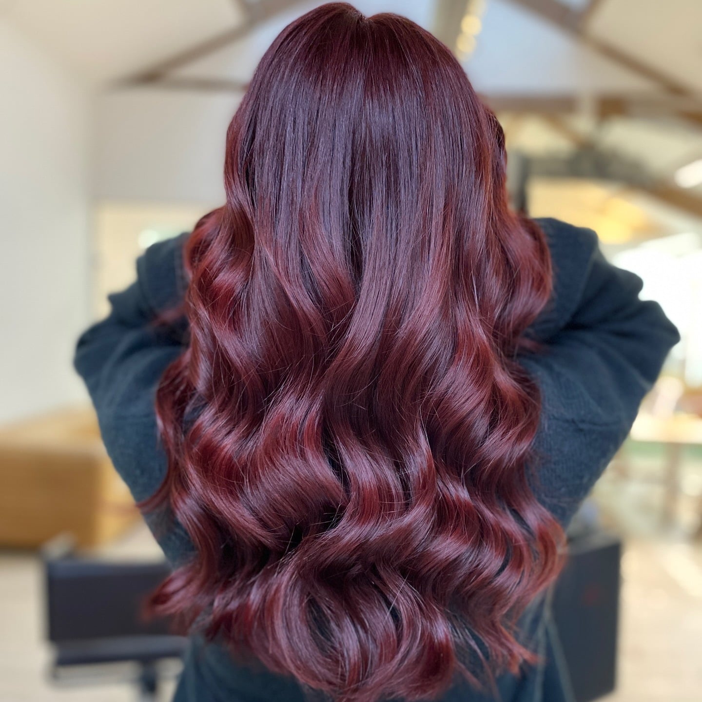 10. Glossy Cherry Red Glamour Curls - Cherry Red Hair Color