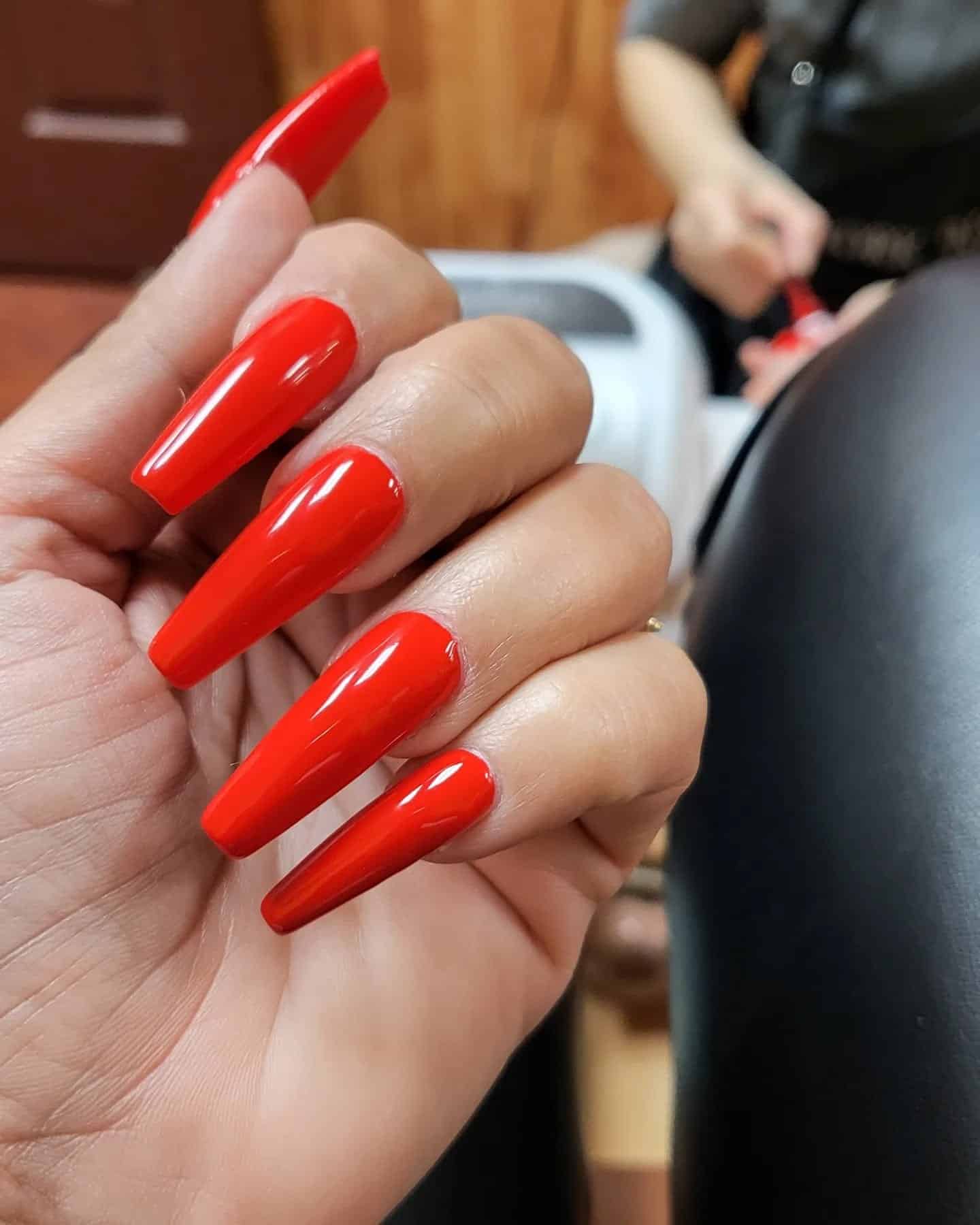 7. Fiery Scarlet Coffin - red coffin nail ideas
