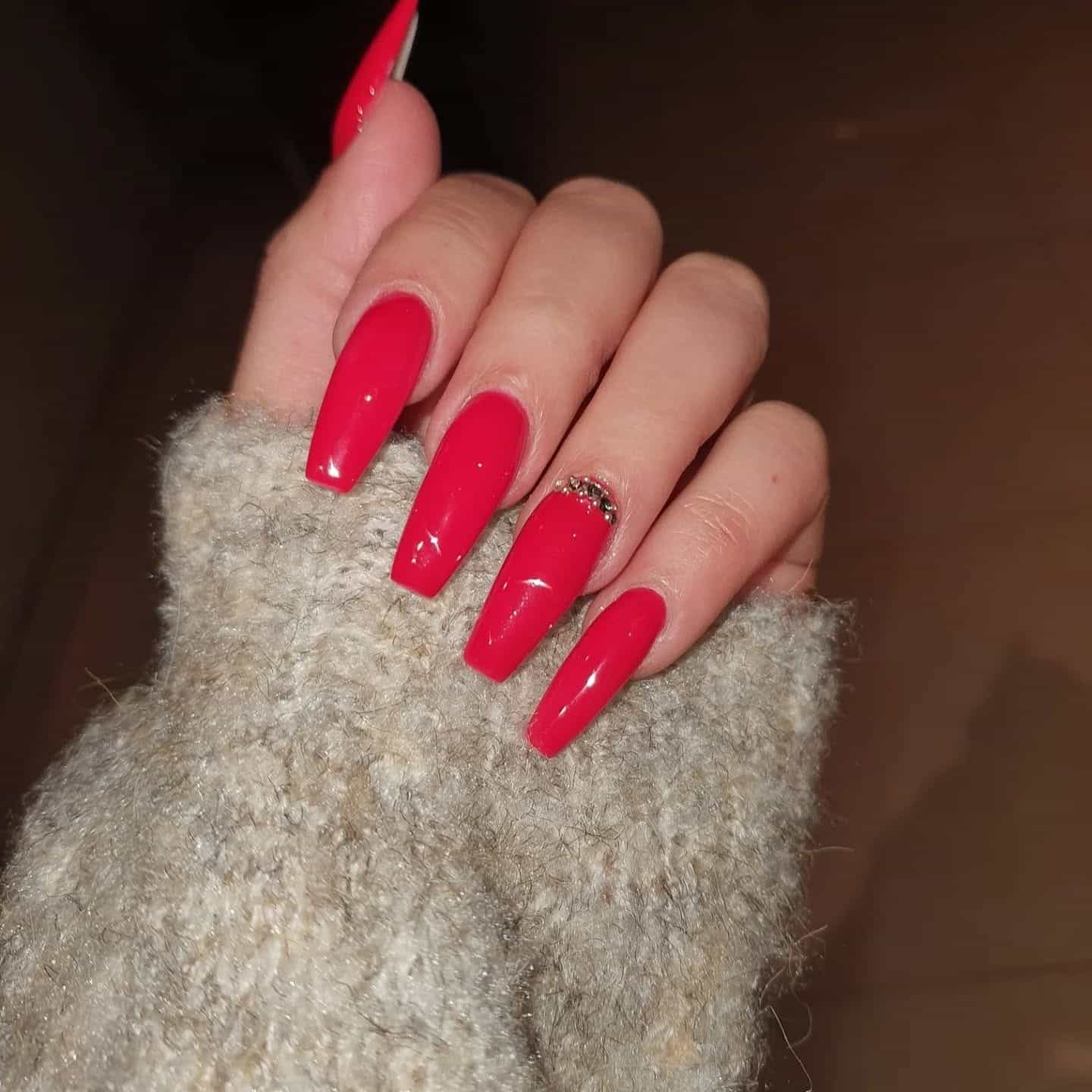 8. Red Coffin with Subtle Crystal Accent - red coffin nail ideas