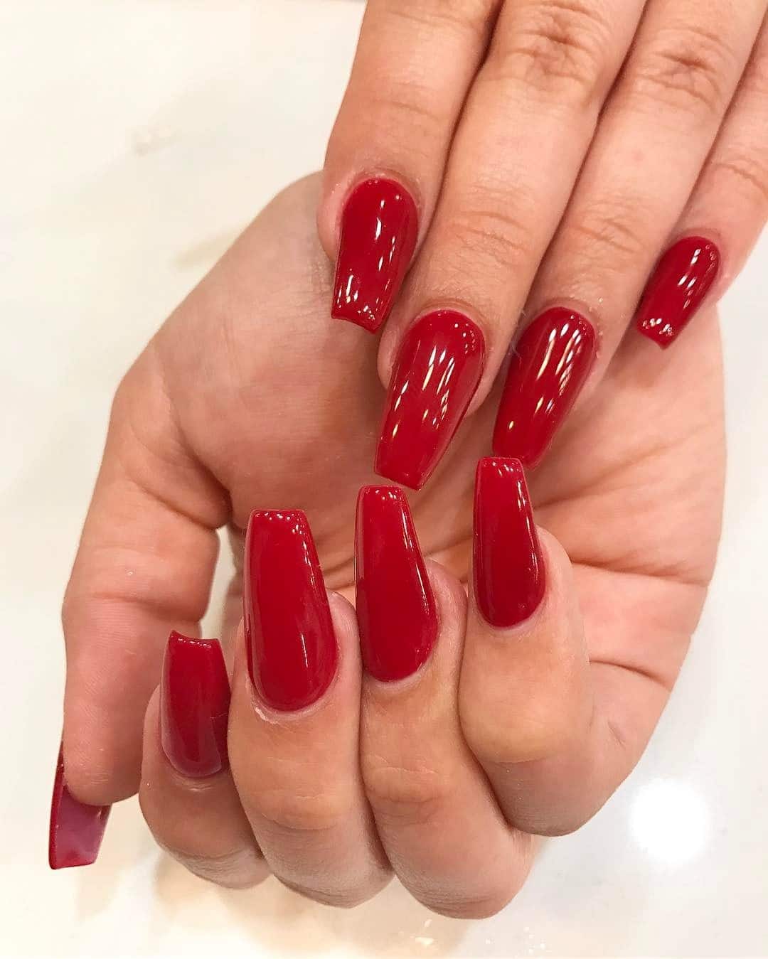 9. Classic Garnet Coffin - red coffin nail ideas