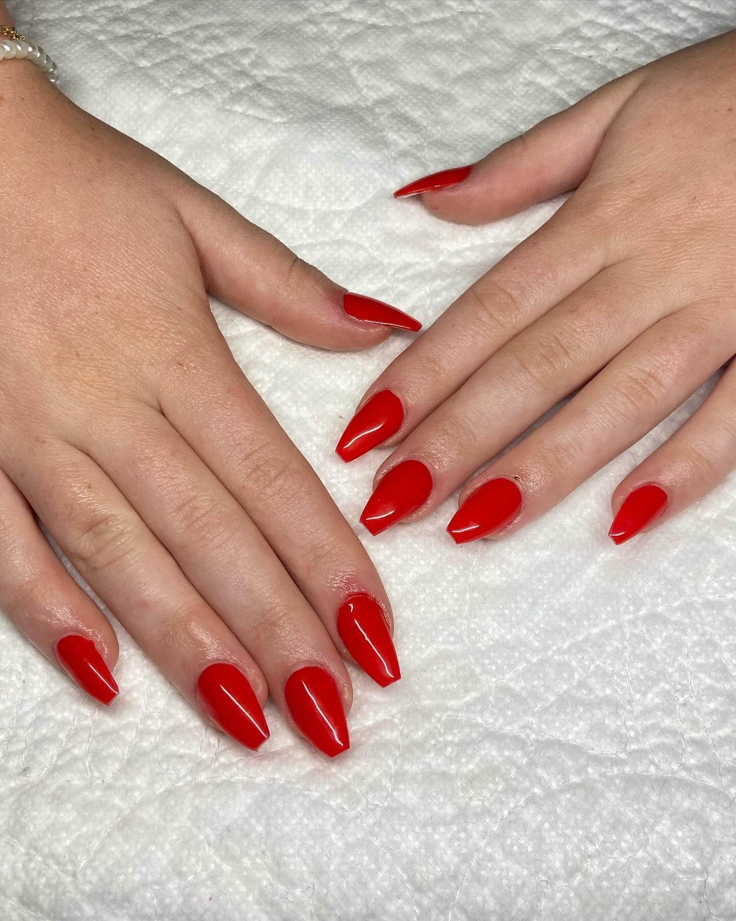11. Glossy Scarlet Coffin - red coffin nail ideas