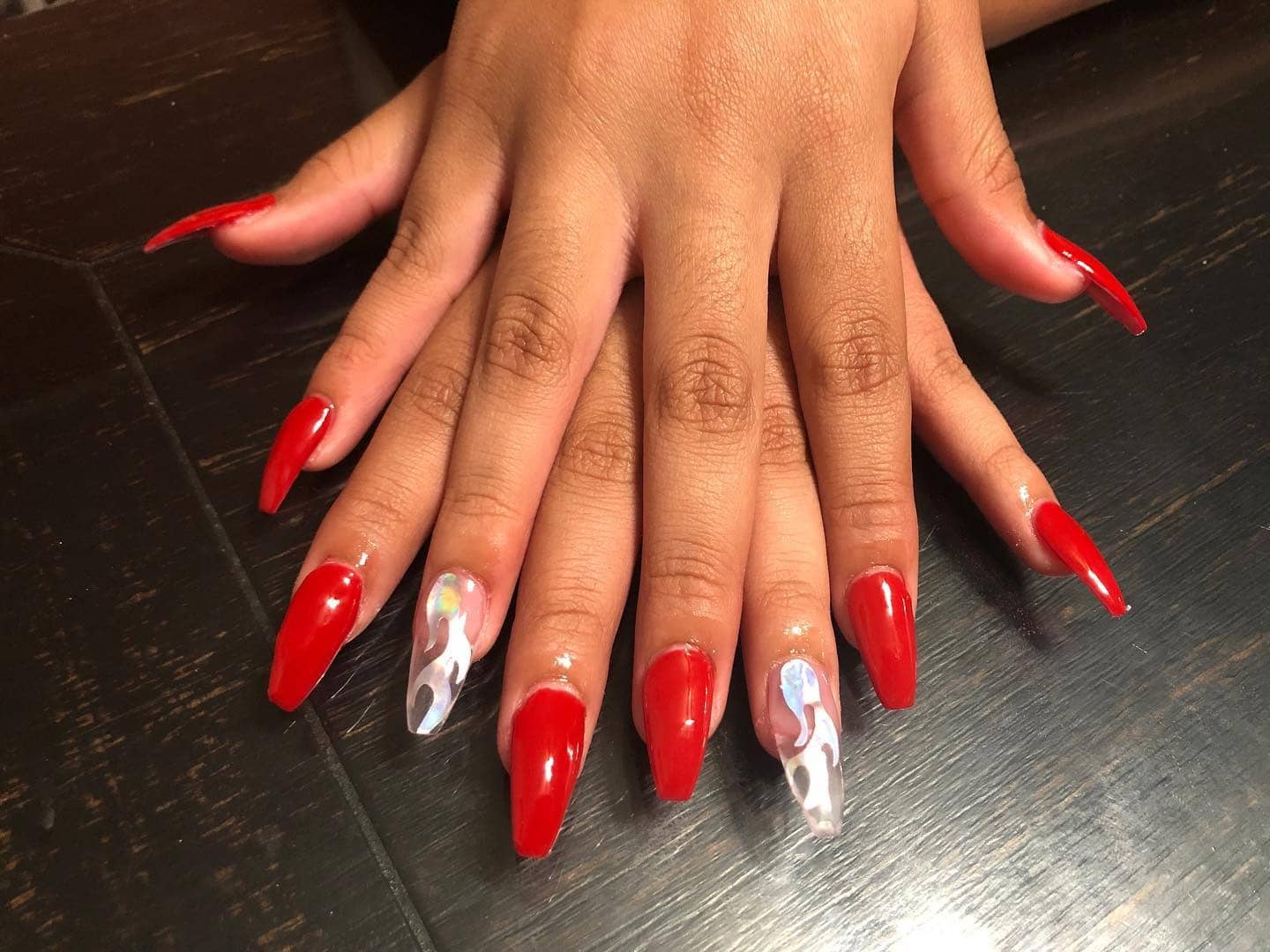 13. Red Coffin with Flame Accents - red coffin nail ideas