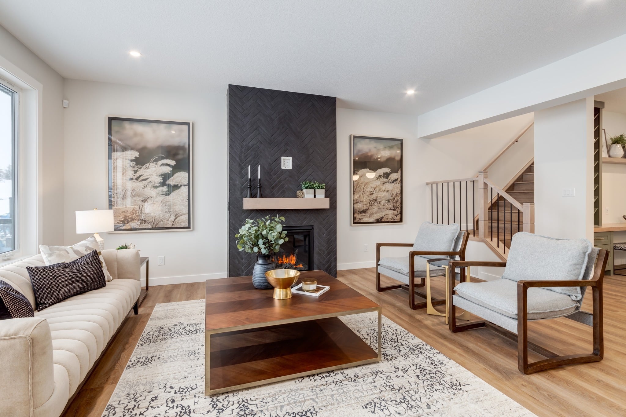 5. Sleek Minimalism with Dark Drama - stone fireplace living room ideas