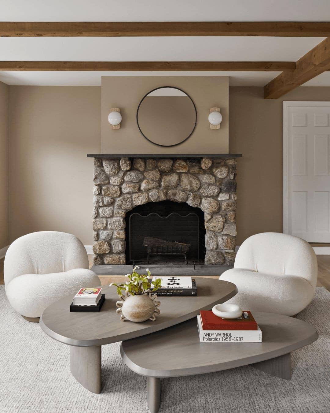 20. Mid-Century Edge with Rounded Stone - stone fireplace living room ideas