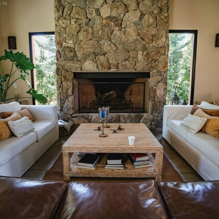 21. Natural Texture with Rustic Stone - stone fireplace living room ideas