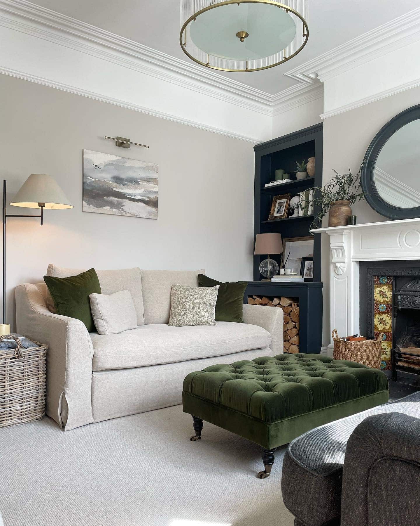 7. Cozy Tradition with Modern Touches - grey floor living room ideas