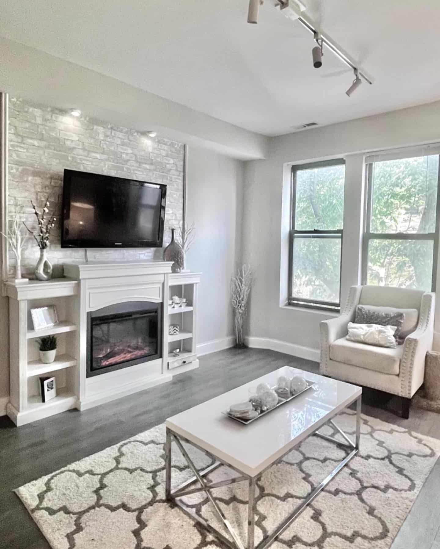 9. Light and Airy with Subtle Glam - grey floor living room ideas