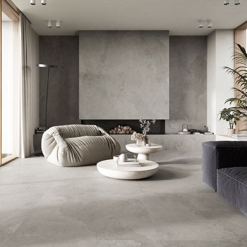 11. Minimal Elegance in Monochrome Grey - grey floor living room ideas