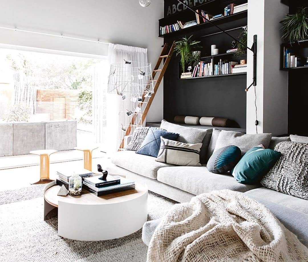 14. Contemporary Loft with Graphic Accents - grey floor living room ideas