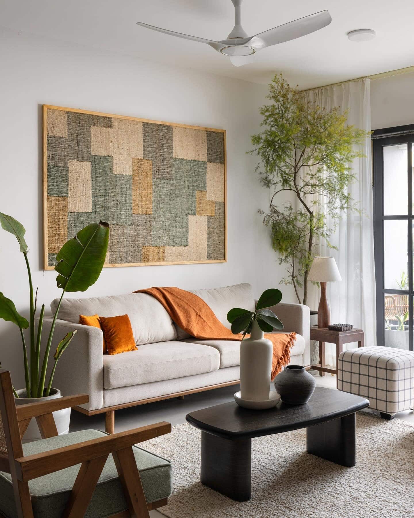 17. Natural Accents with Earthy Pops - grey floor living room ideas