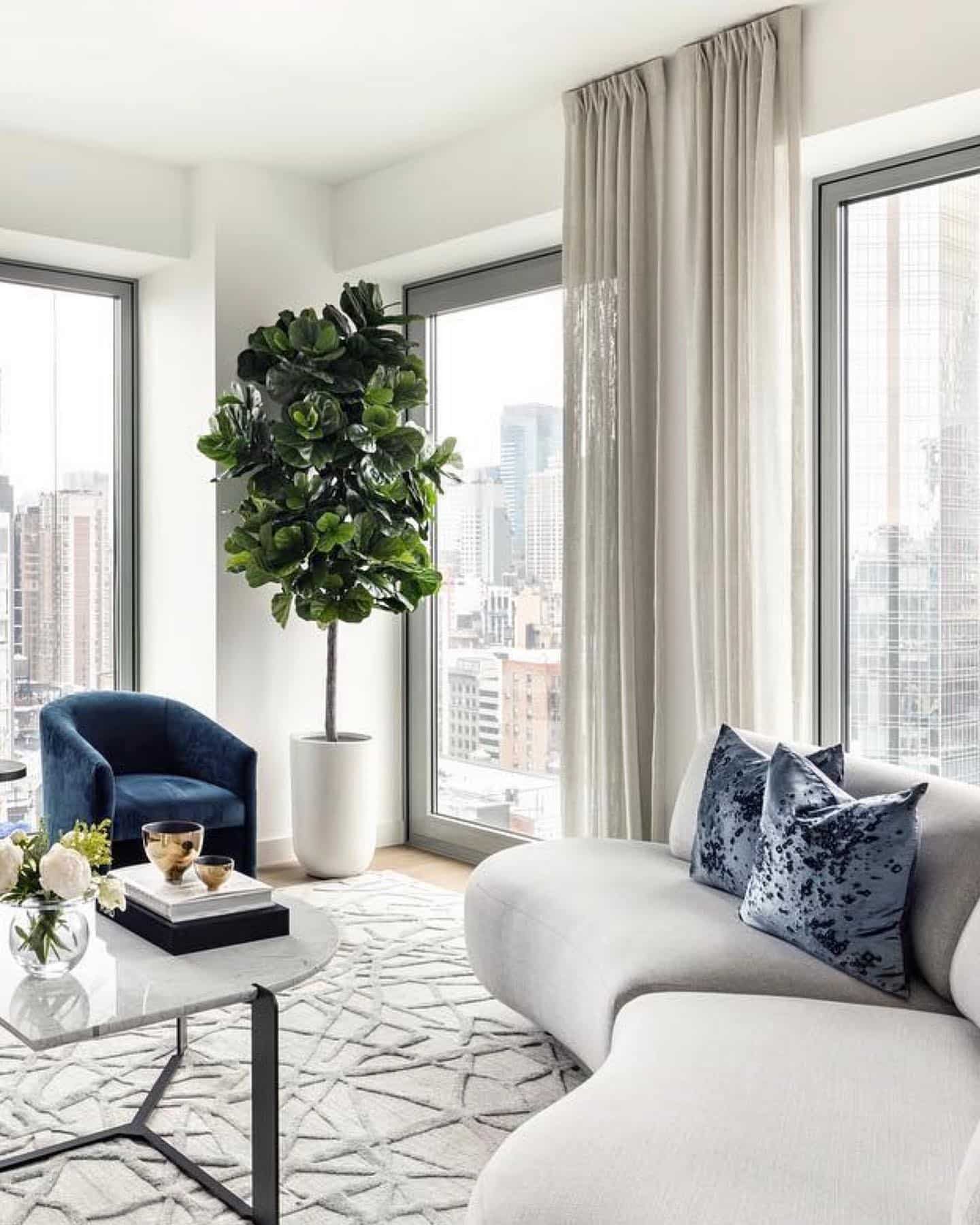 18. City View Elegance with Grey Geometry - grey floor living room ideas