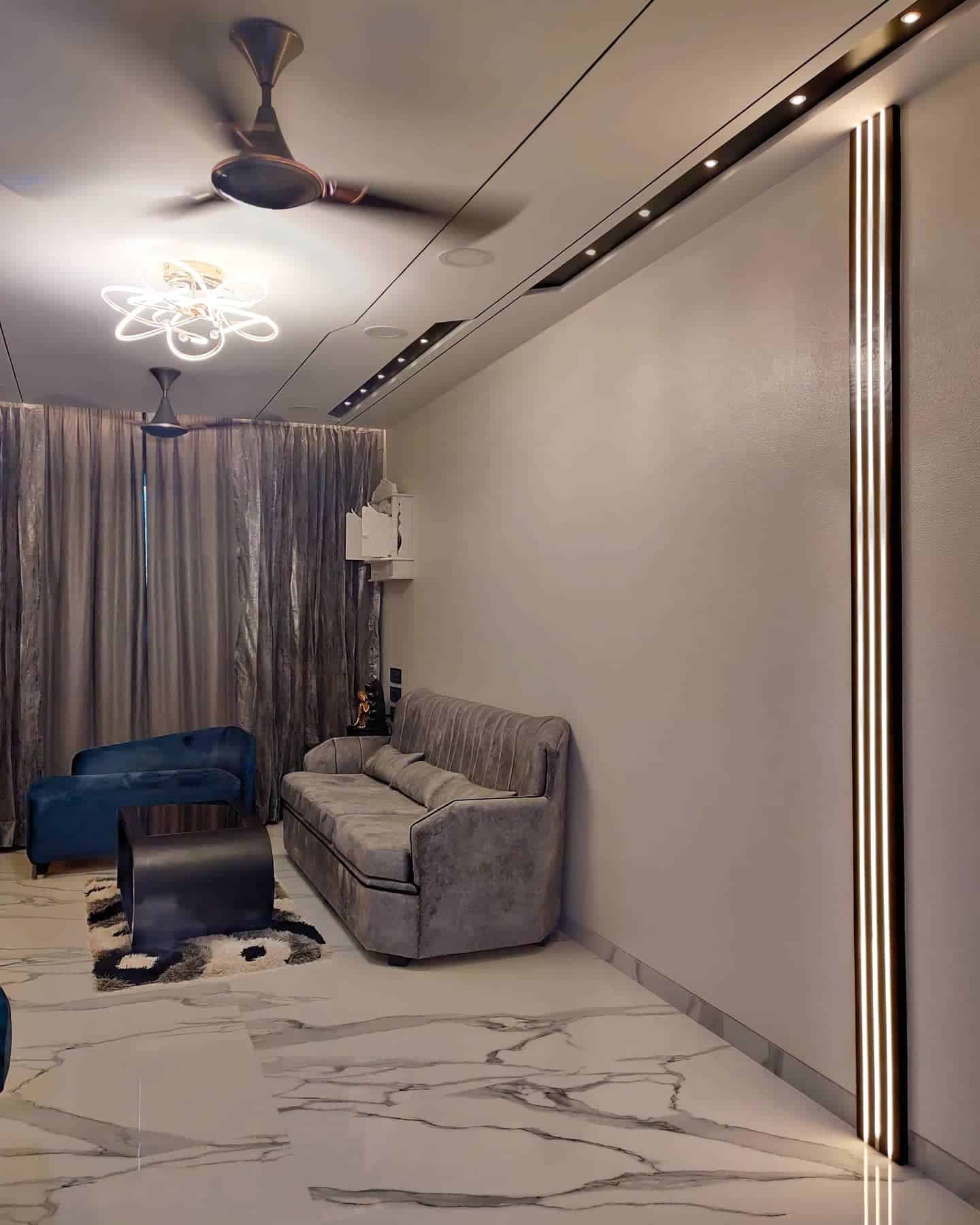 19. Modern Luxe with Marble Flooring - grey floor living room ideas