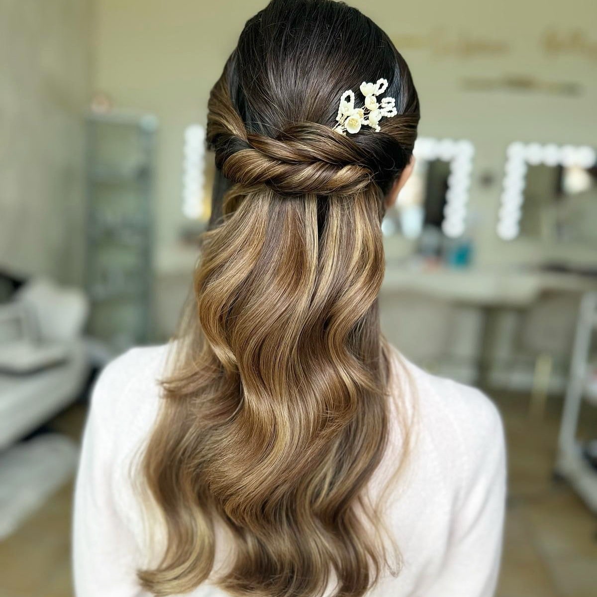 9. Twisted Half-Up Waves with Floral Pin β Caramel Balayage - Bride Hairstyles