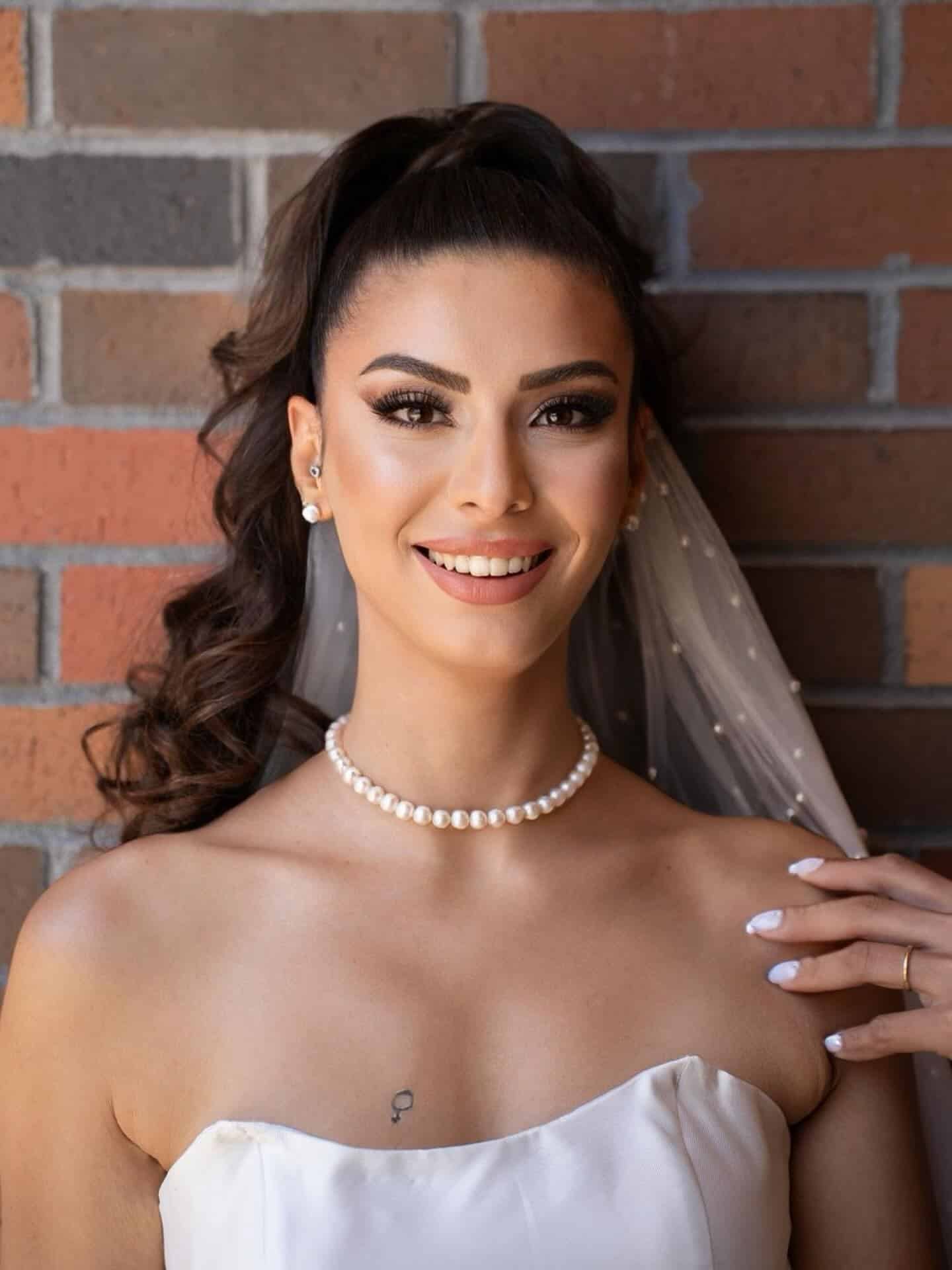 21. High Ponytail with Soft Waves β Dark Brunette - Bride Hairstyles