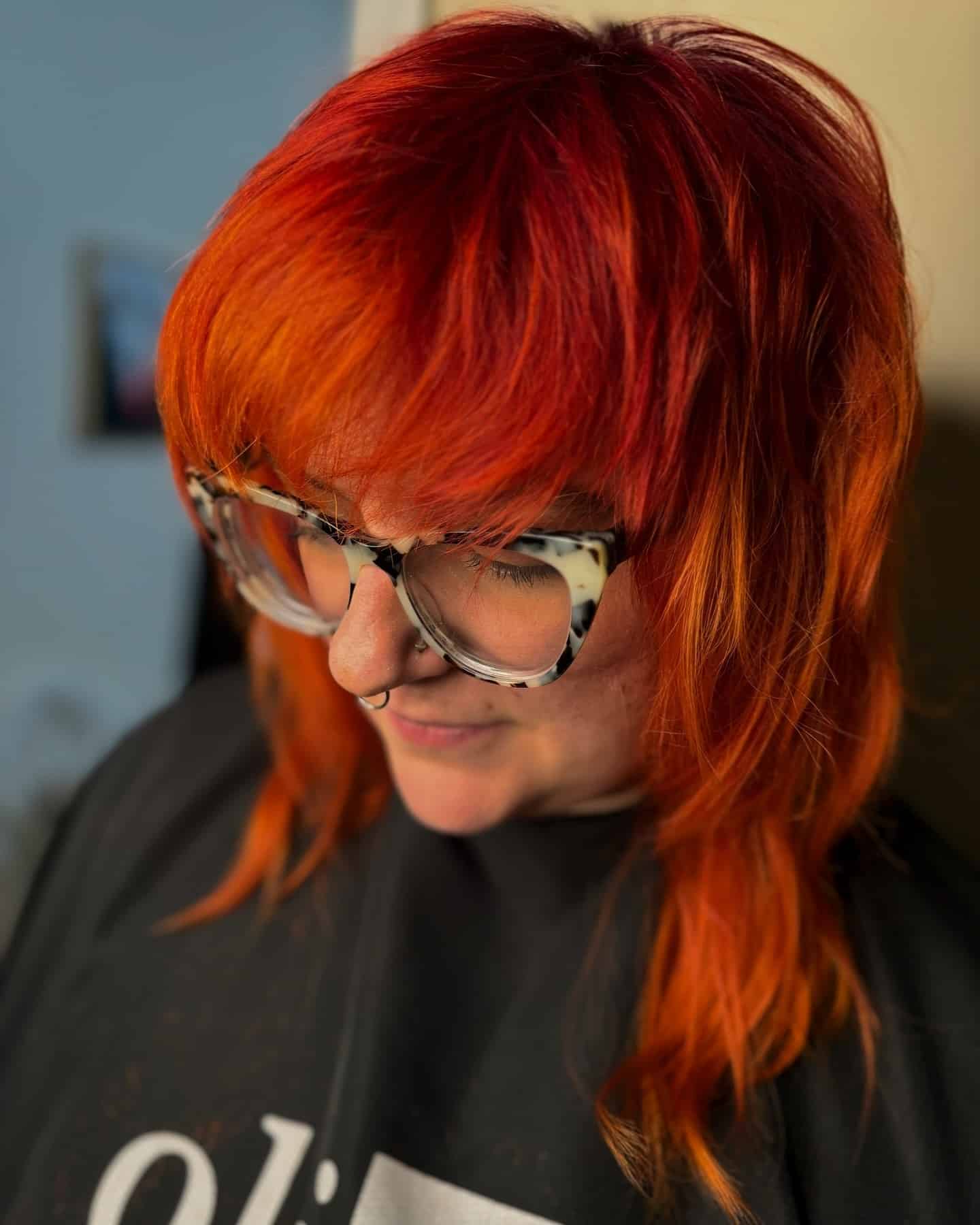 5. Flame-Kissed Shag - Red Orange Hair Color