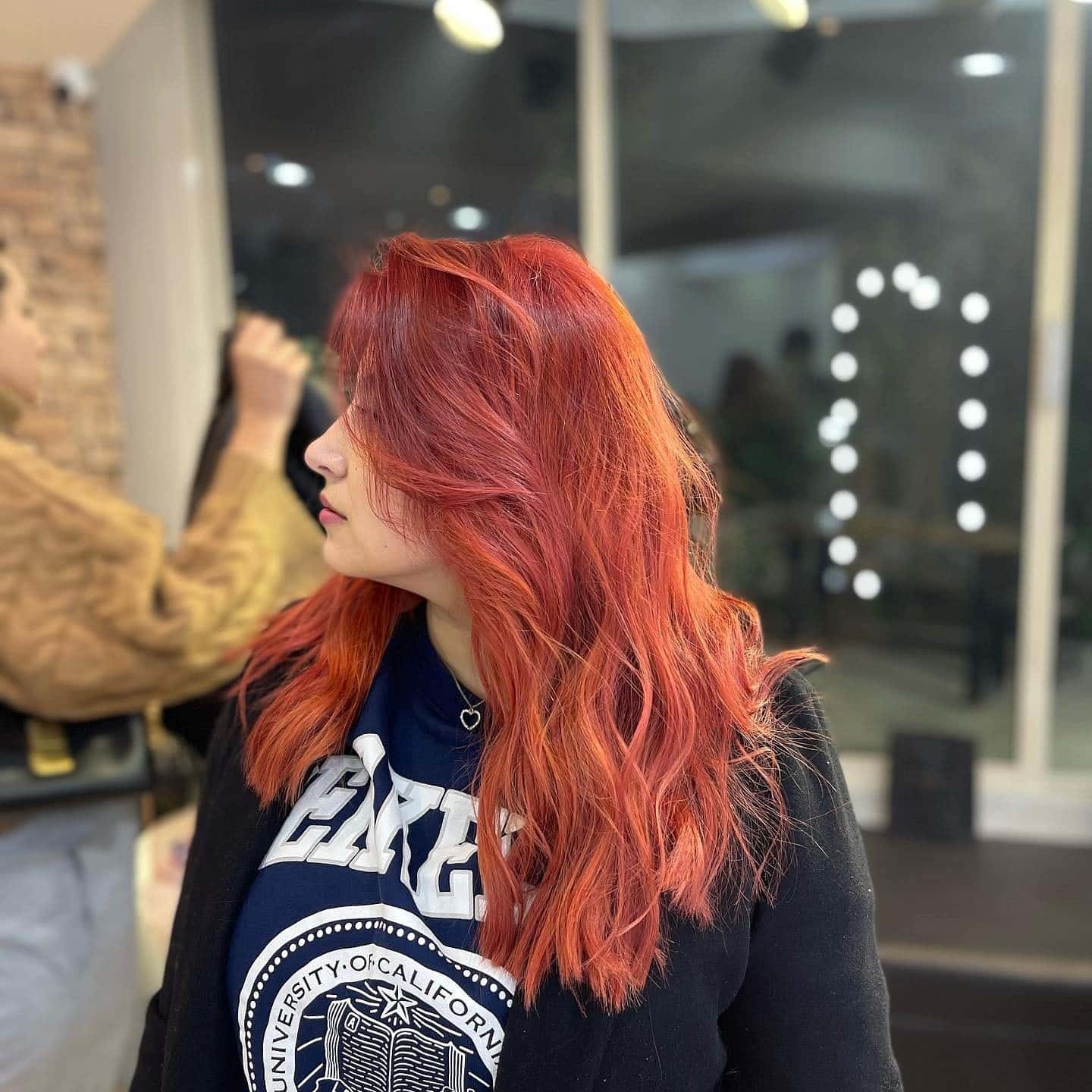 17. Radiant Red Layers - Red Orange Hair Color