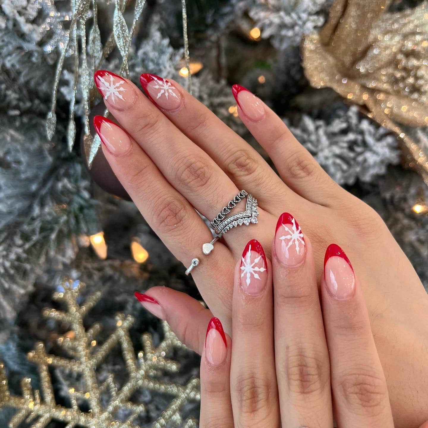 4. Festive Red French with Snowflakes - red french tip nail ideas