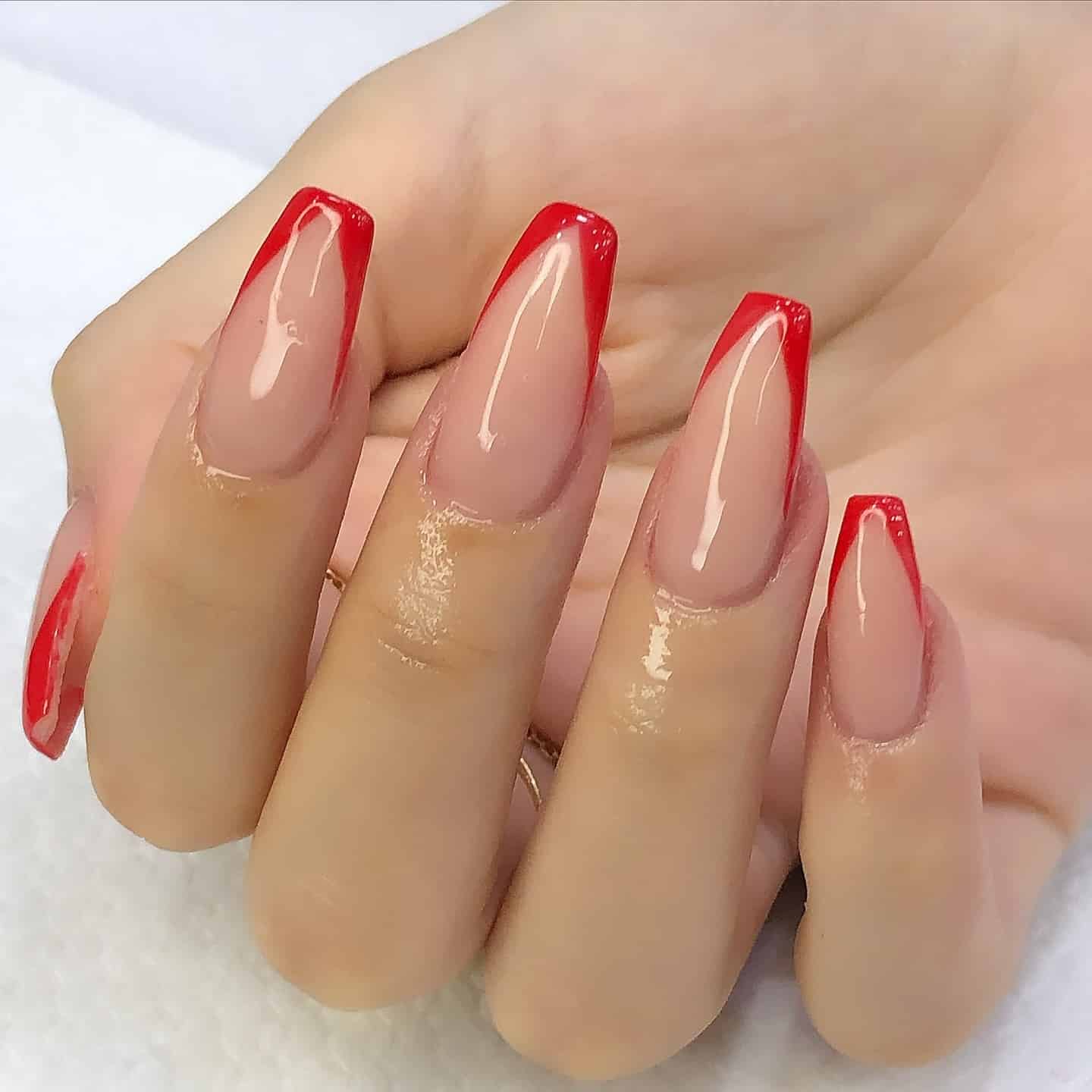 8. Modern Coffin Red French Tips - red french tip nail ideas