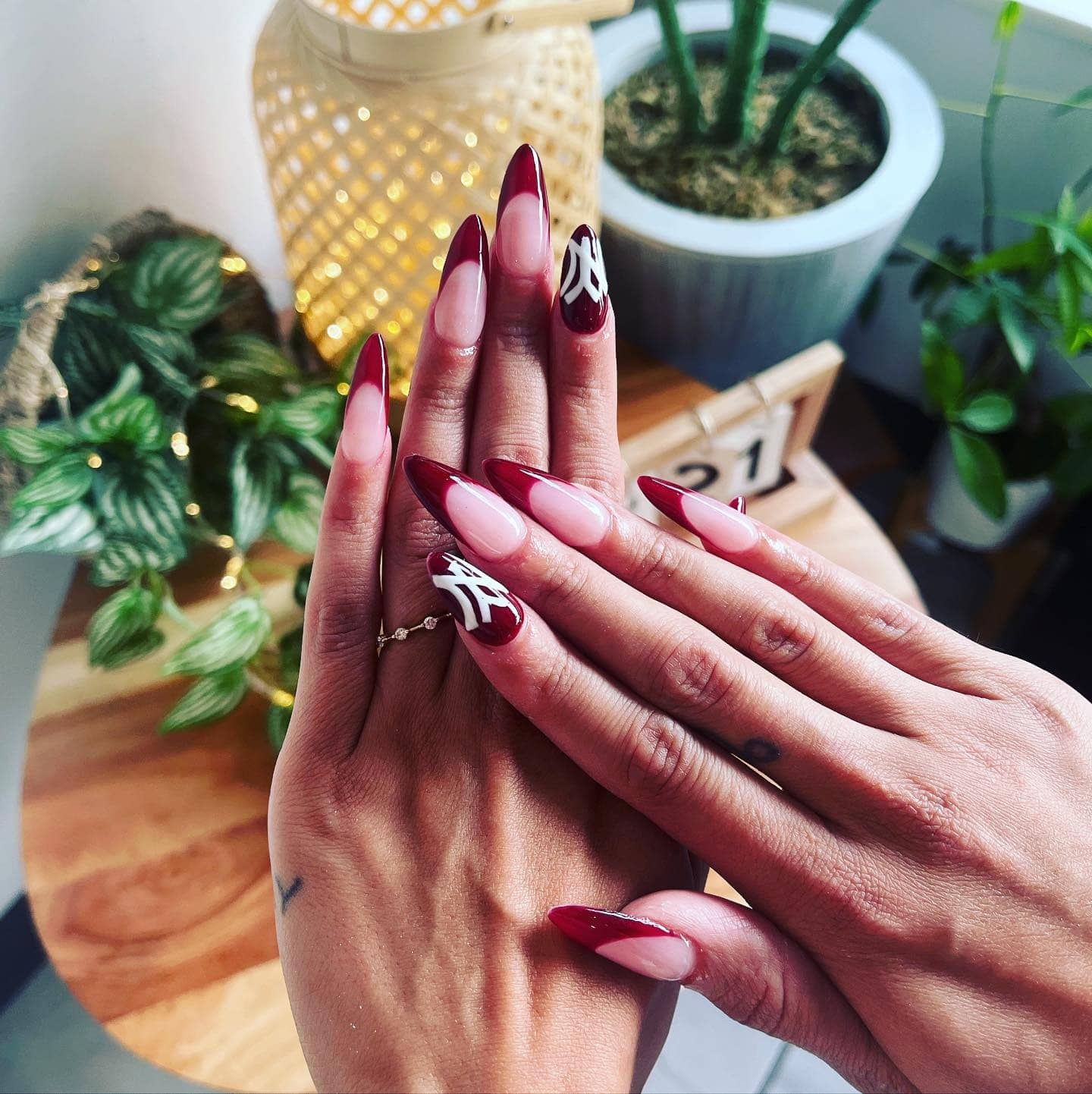 13. Deep Red French Tips with Accent Nail Art - red french tip nail ideas