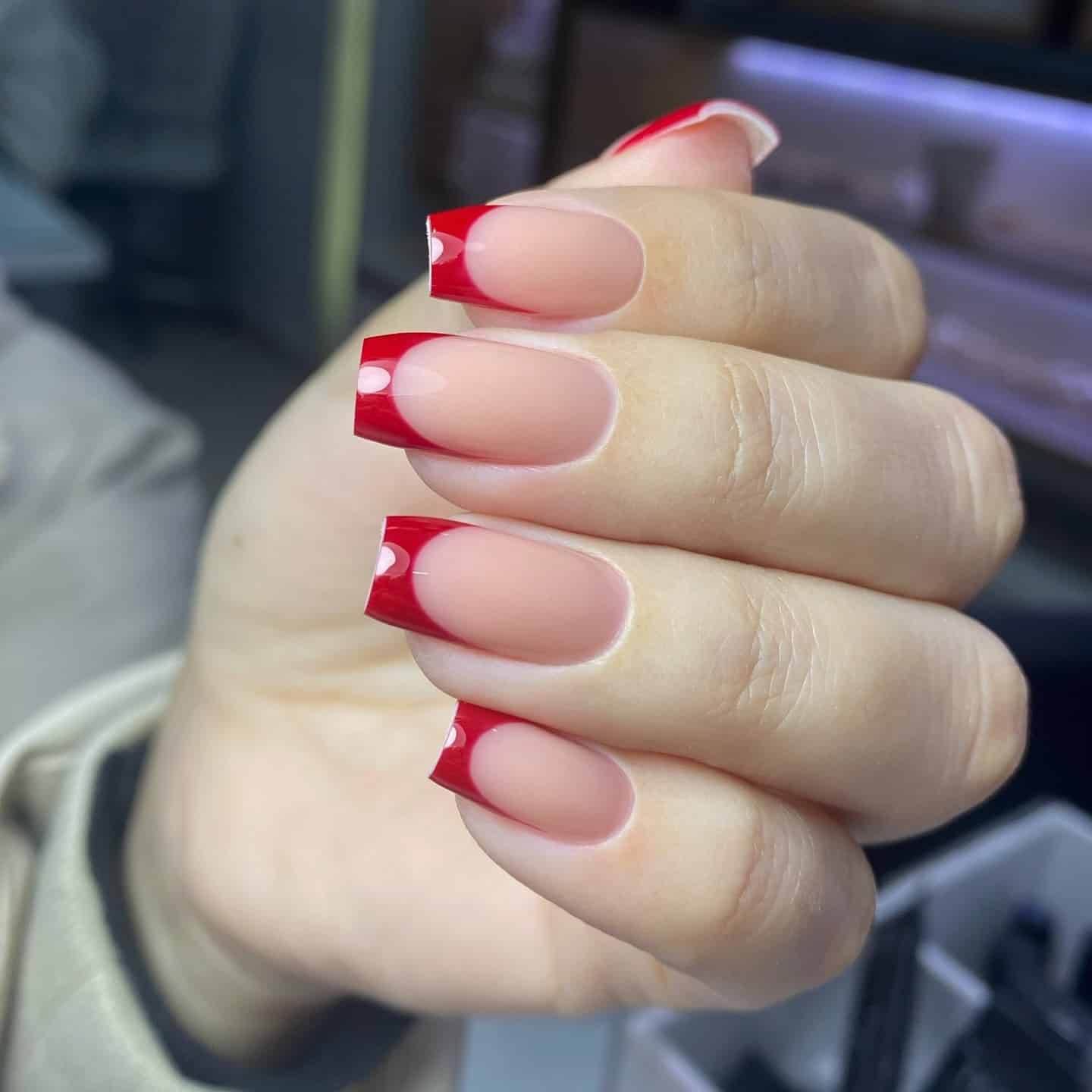 21. Glossy Square Red French Tips - red french tip nail ideas
