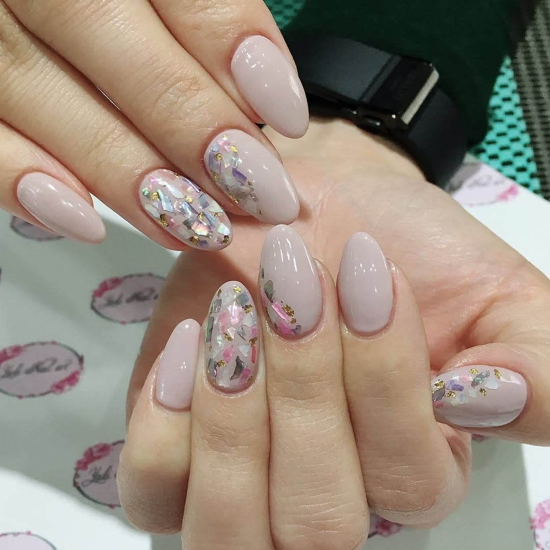 1. Soft Blush Shell Shimmer - shell nail ideas