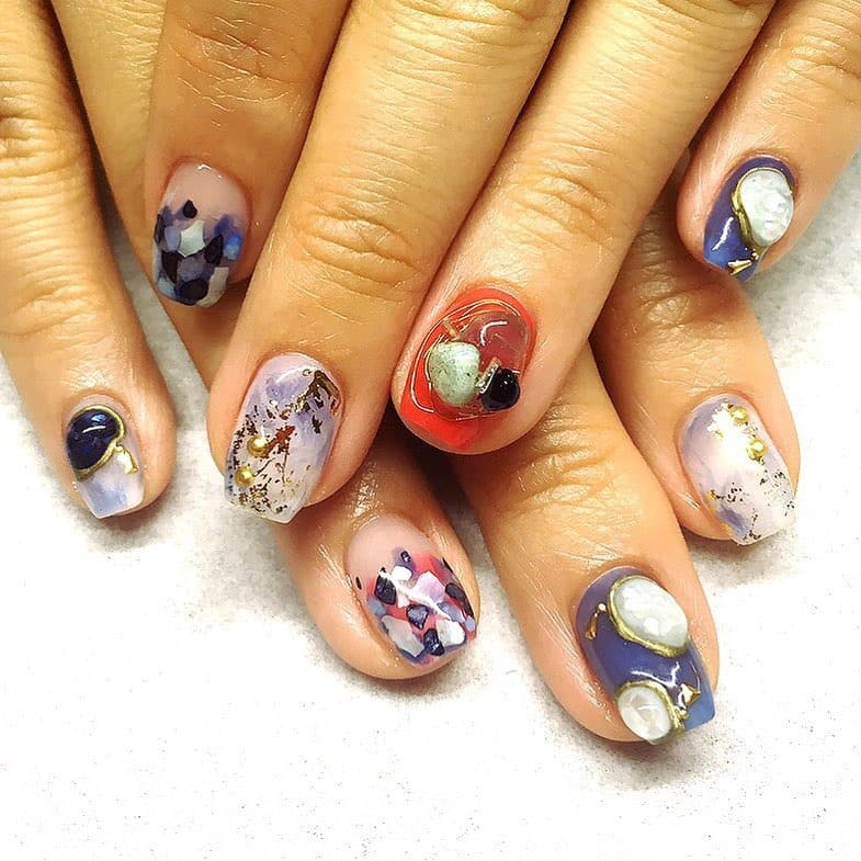 3. Bold Ocean Mosaic - shell nail ideas