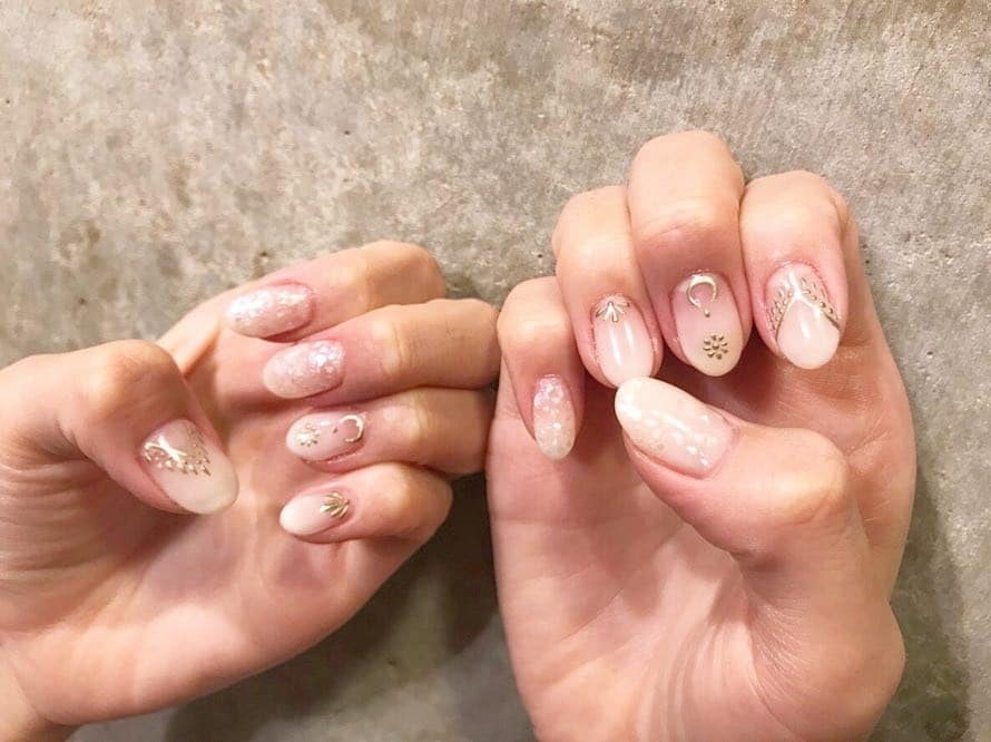 4. Pearl White Shell Elegance - shell nail ideas