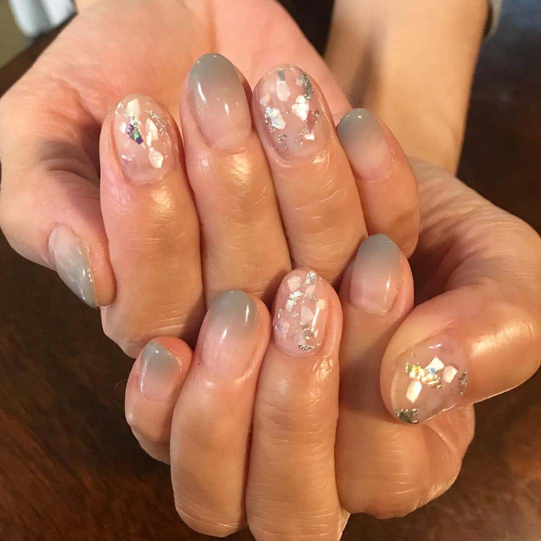 5. Smoky Gray Shell Fade - shell nail ideas