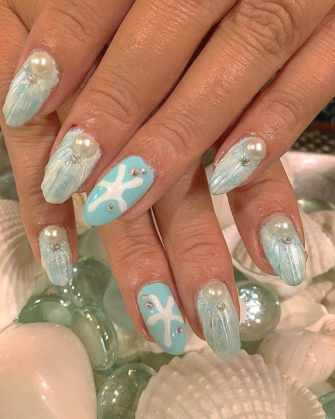 7. Aqua Pearl Shell Fantasy - shell nail ideas