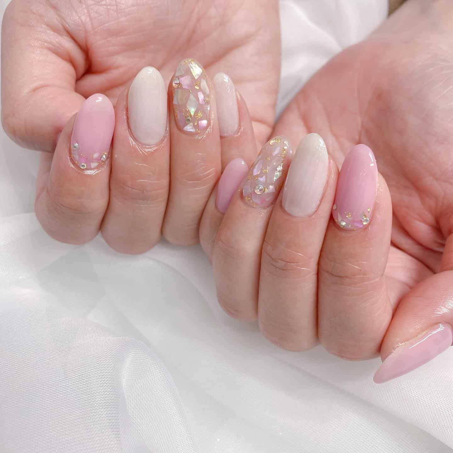 13. Pink Pearl Shell Radiance - shell nail ideas