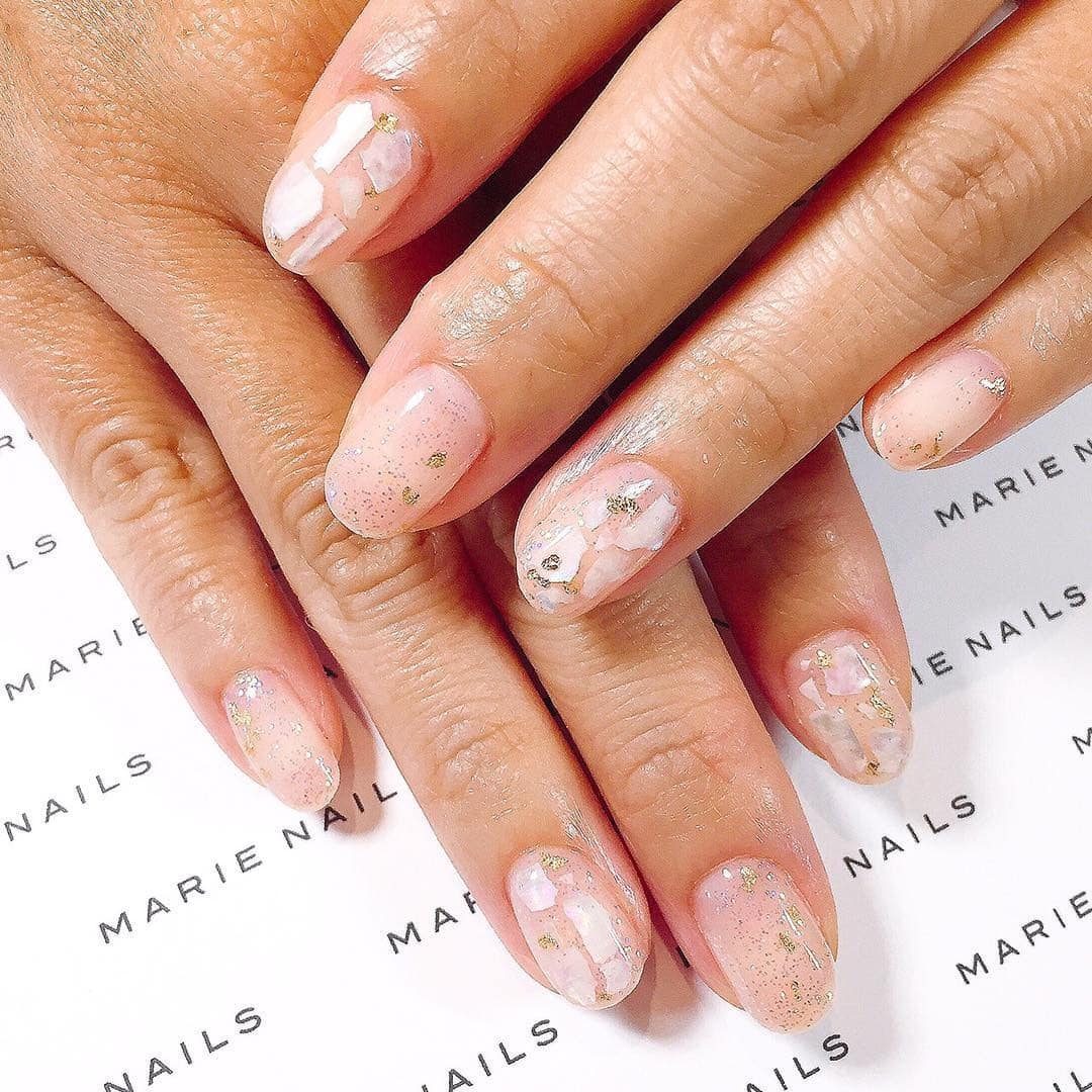 16. Subtle Shell Mist - shell nail ideas