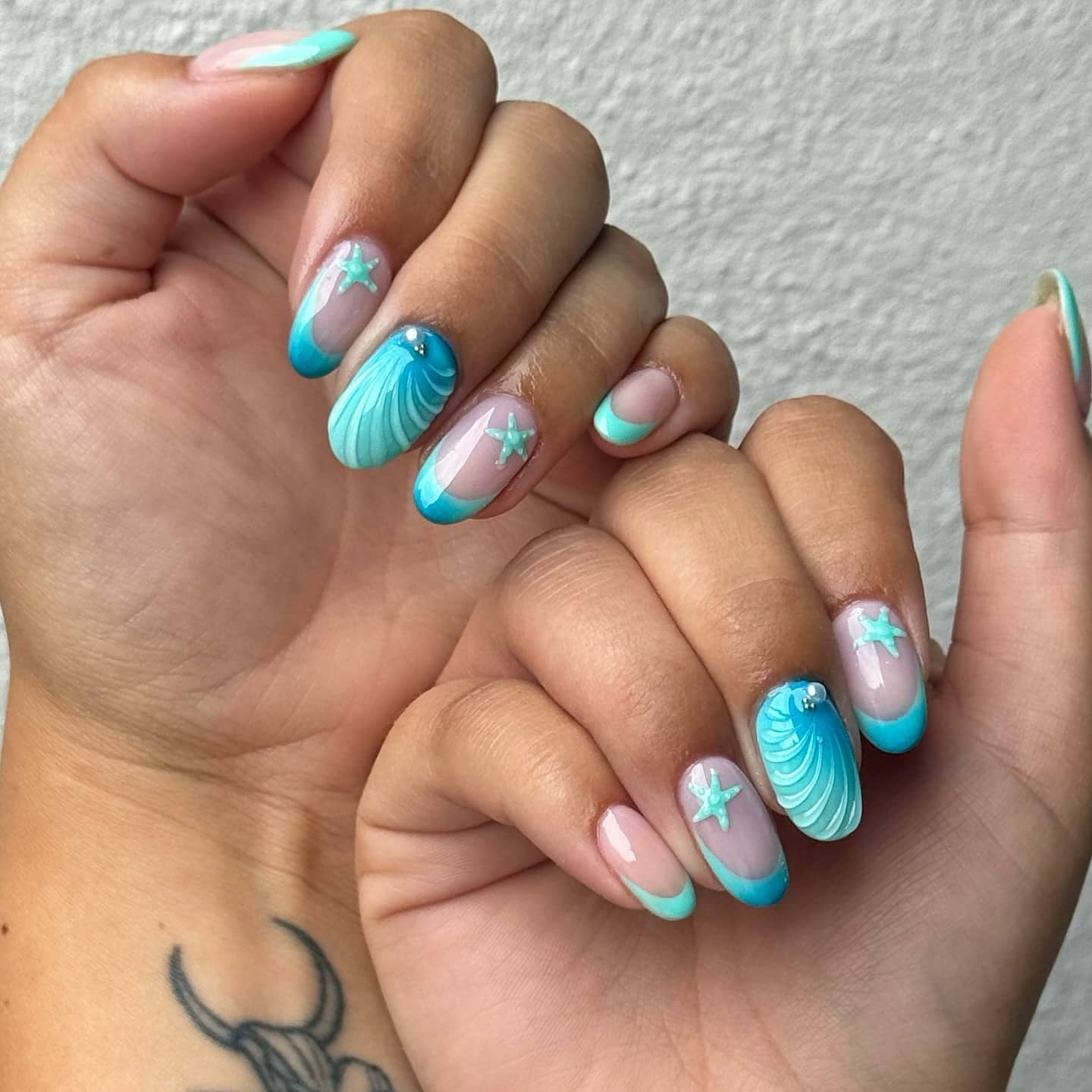 18. Aqua Starfish French - shell nail ideas