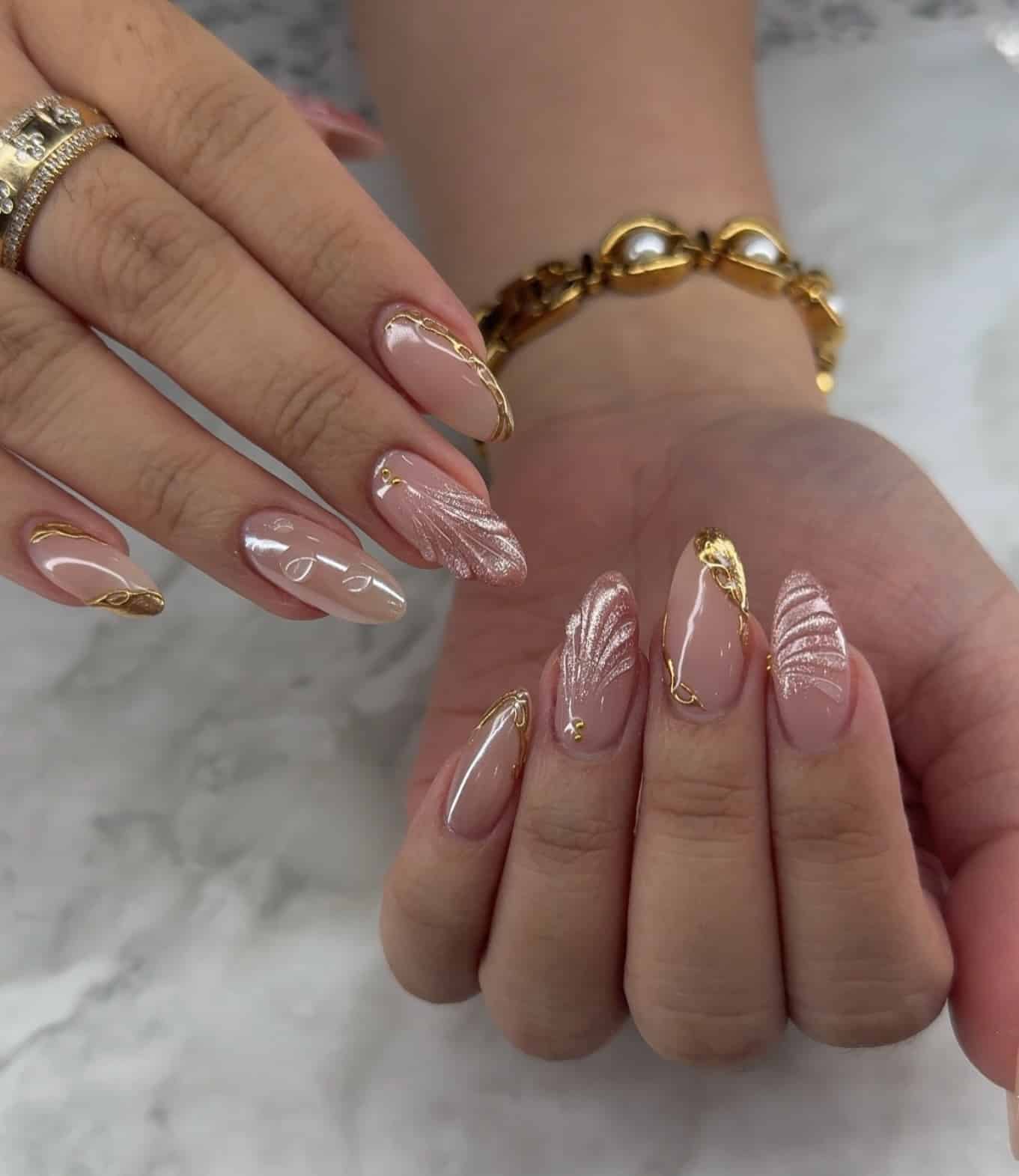 19. Rose Gold Shell Luxury - shell nail ideas