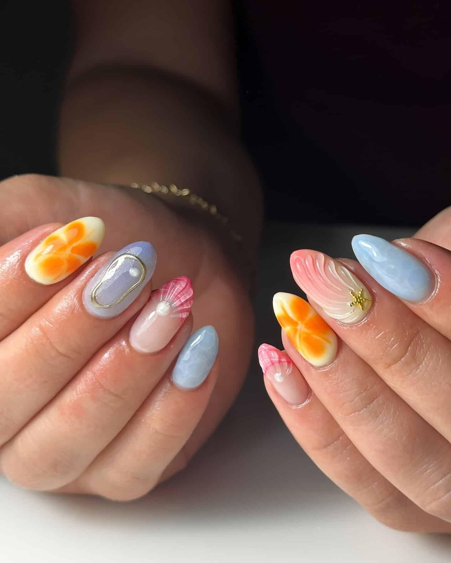 20. Tropical Shell Fantasy - shell nail ideas